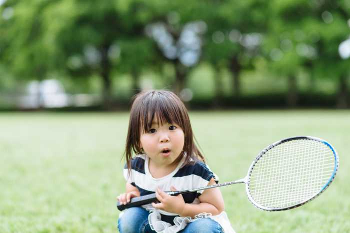 Little girl with Badminton racquet